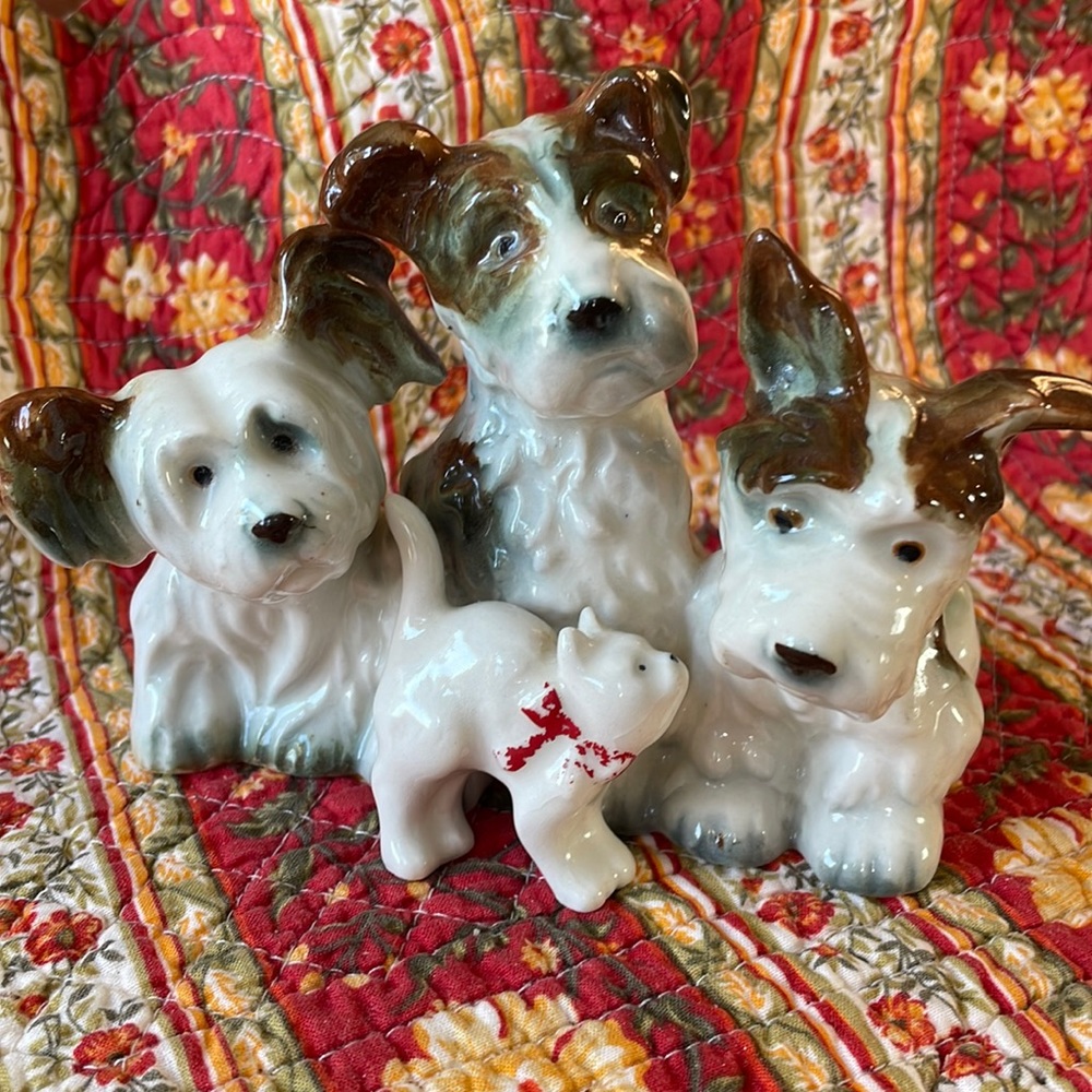 Porcelain dog and cat figurines